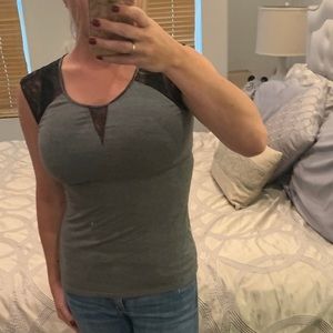 Cotton, form-fitting blouse with lace cap sleeves